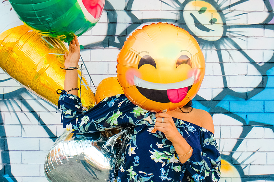7 – Happy balloons emoji